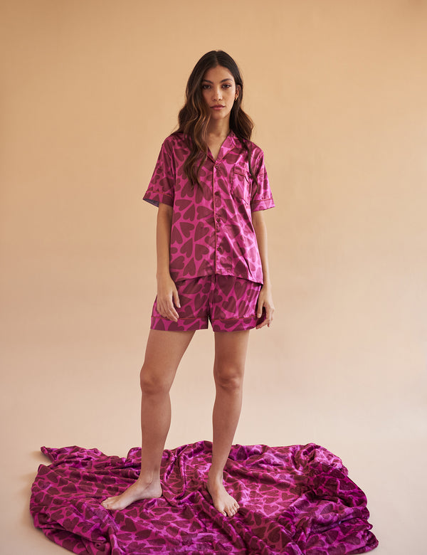 Corazones rosados short seda // Defectos en la prenda