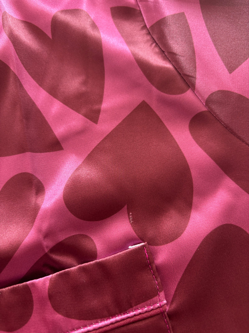 Corazones rosados short seda // Defectos en la prenda